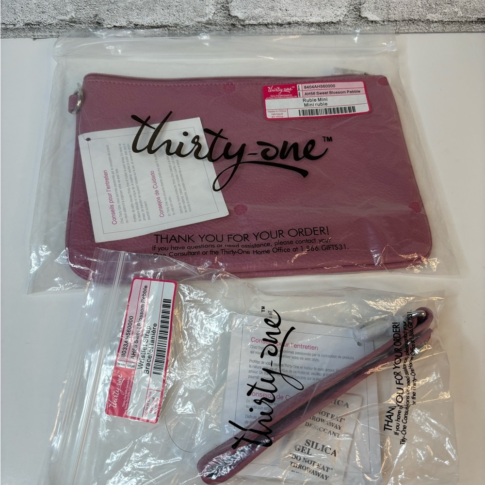 Thirty One Rubie Mini and Wrist Strap. Brand New